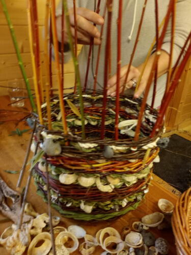 A foraged fiber basket in progress